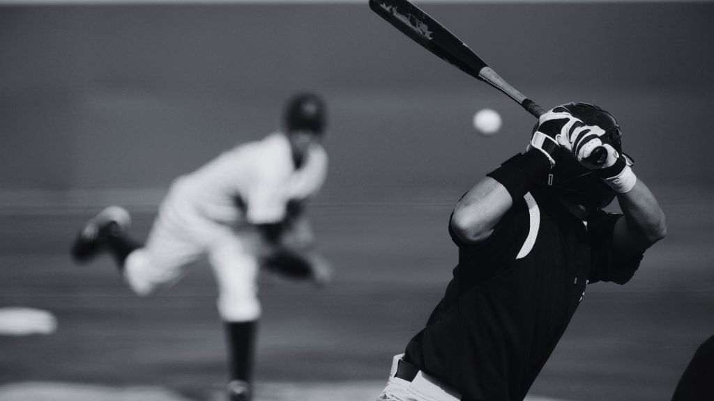 Did the Dodgers Cheat? You need a cheat sheet: Adapting to AI-Driven Search - Black and white photo of a pitcher throwing to a batter